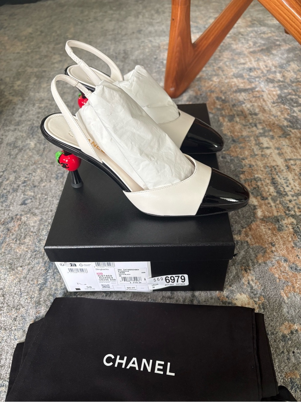 CHANEL White and Black Slingback Pumps with Apple logo on heel.